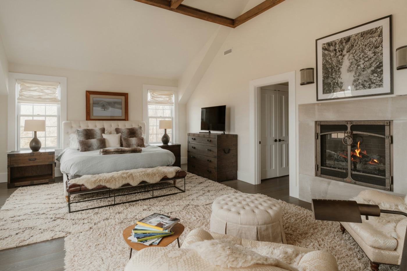Hearth Suite with king bed, sheepskin throws and a gas fireplace